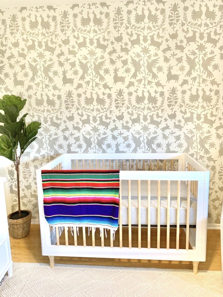 Babyletto lolly crib in gender neutral nursery with otomi stenciled wall