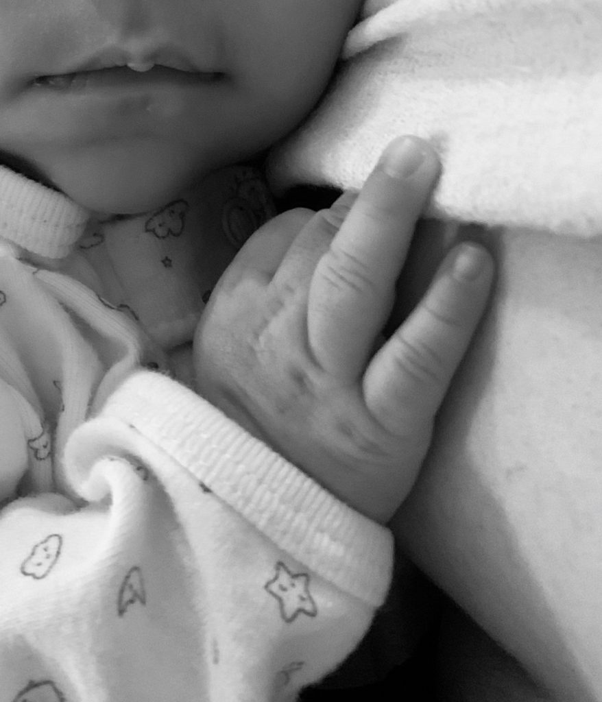 10-week-old baby breastfeeding after relactation